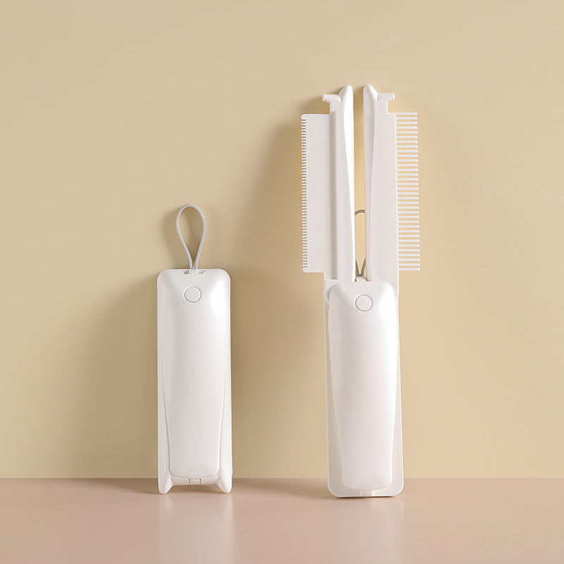 Peigne pliable rose et blanc pour animaux